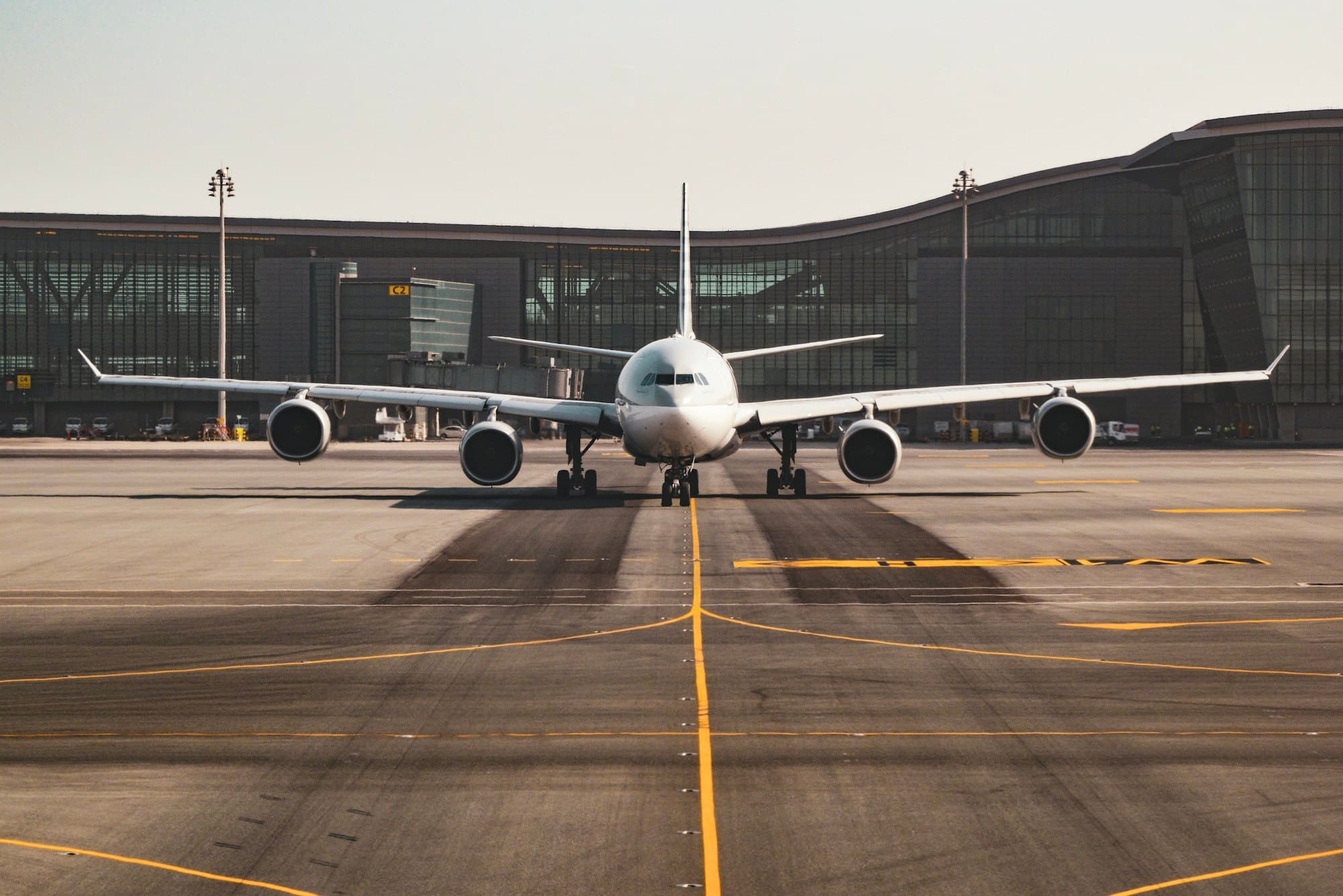 Passenger aircraft facing forward on an airport apron